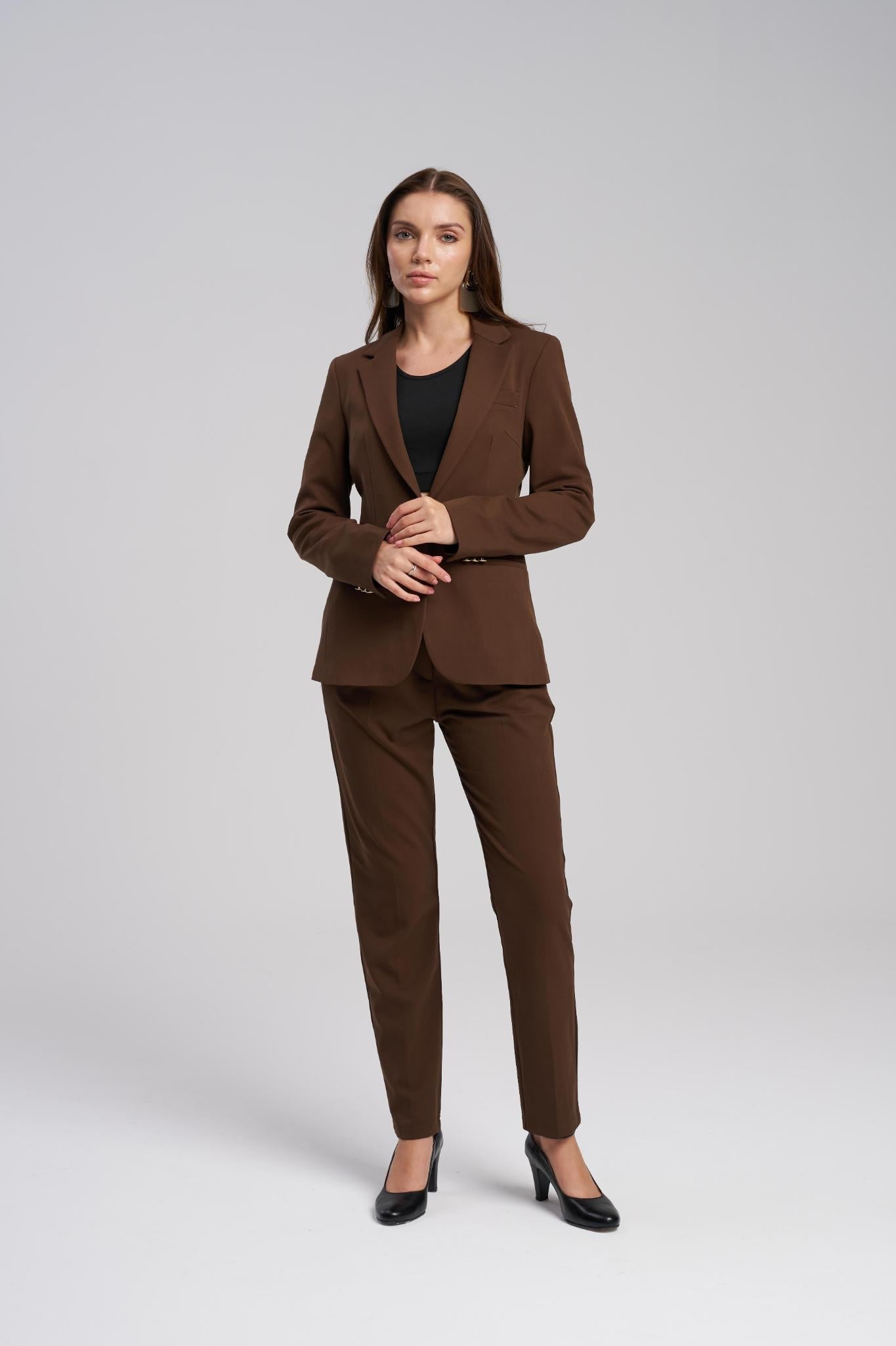 Woman wearing a brown suit on a white background