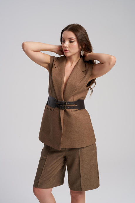 Close up detail of waist belt on tailored vest set