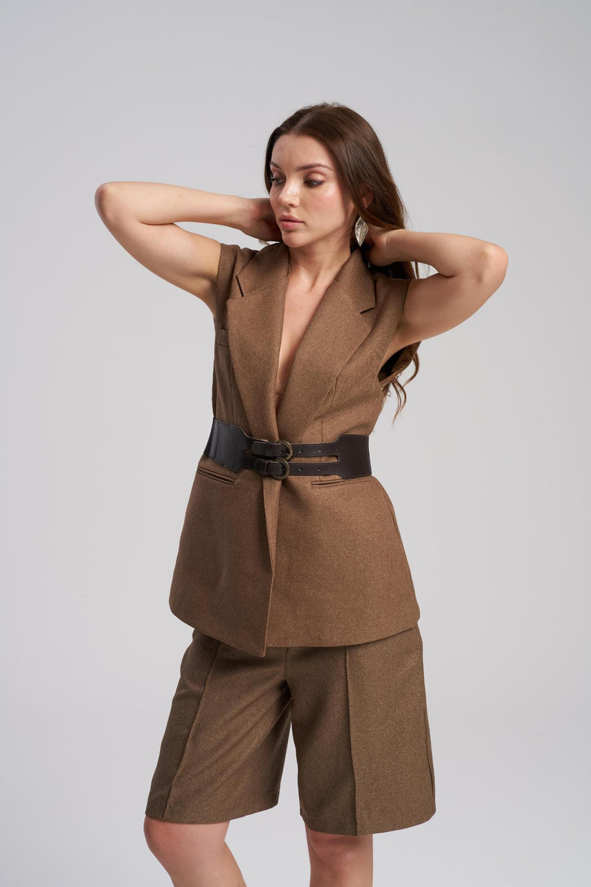 Close up detail of waist belt on tailored vest set